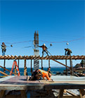 worker working on rooftop